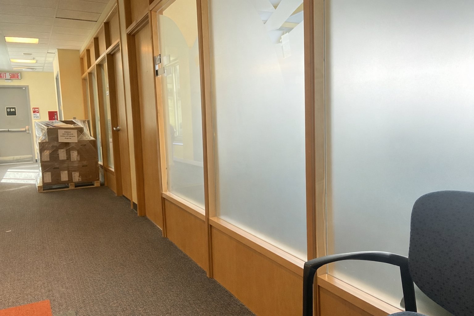 Commercial office corridor with access control security system upgrades in Ottawa