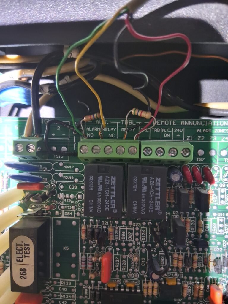 Commercial alarm annunciator and relay board wiring inspected during an Ottawa access control site review
